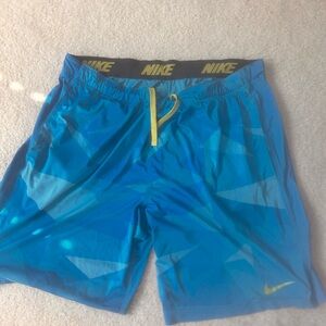 Nike Dynamic Blue Shorts with Yellow Highlights